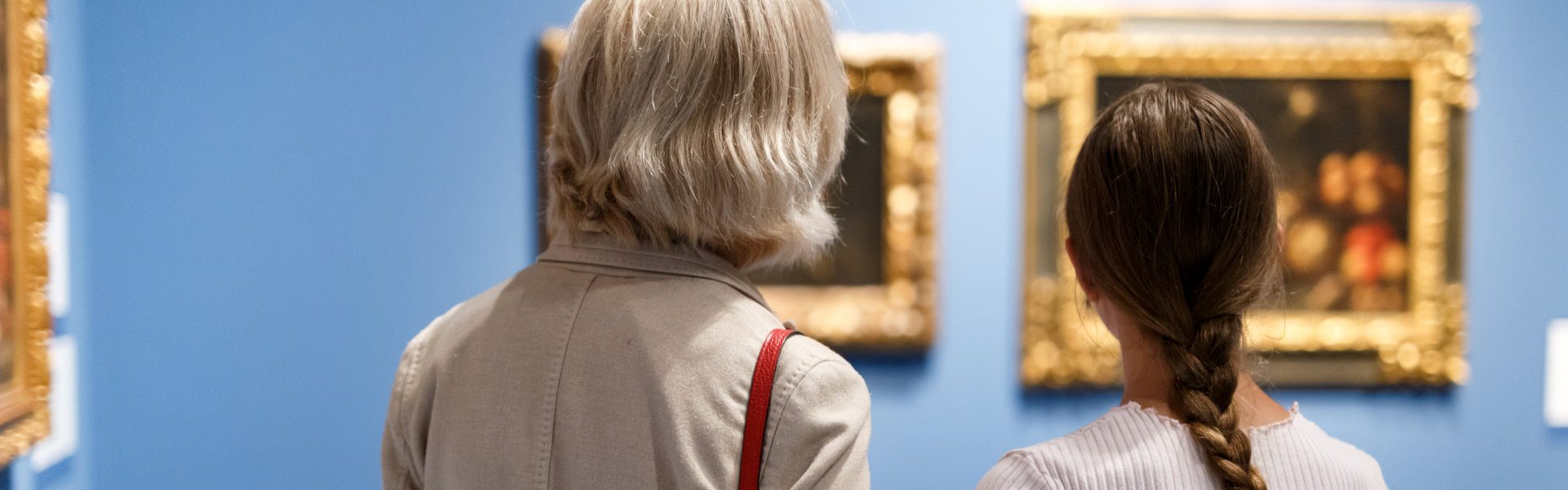 a museum tour guide with the kids and kid's teacher